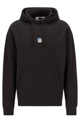 Sweat à capuche mixte Relaxed Fit en coton biologique avec logo exclusif