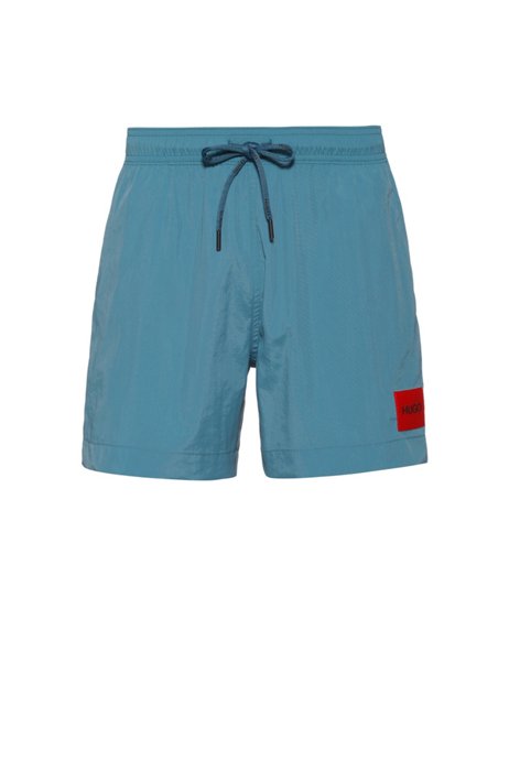 Bañador tipo shorts de secado rápido en tejido reciclado con etiqueta de logo, Azul