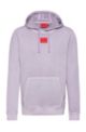Hooded sweatshirt in cotton with red logo label, light pink