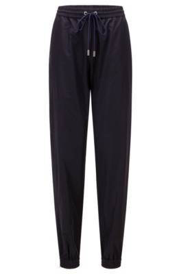 Pantalon Relaxed Fit avec bas de jambes resserrés et taille élastique