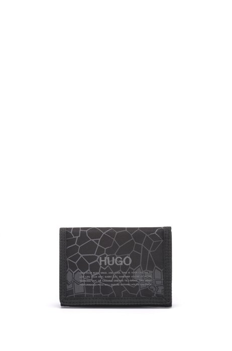Touch-close trifold wallet with snakeskin print and manifesto logo, Black
