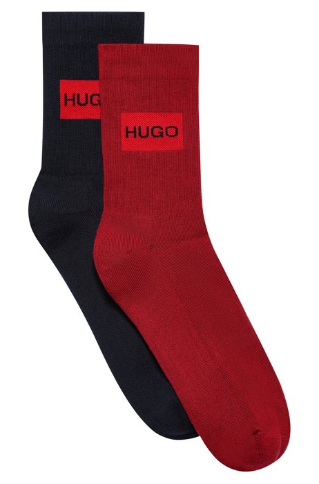 Set van twee paar korte sokken met rood logo, lichtrood