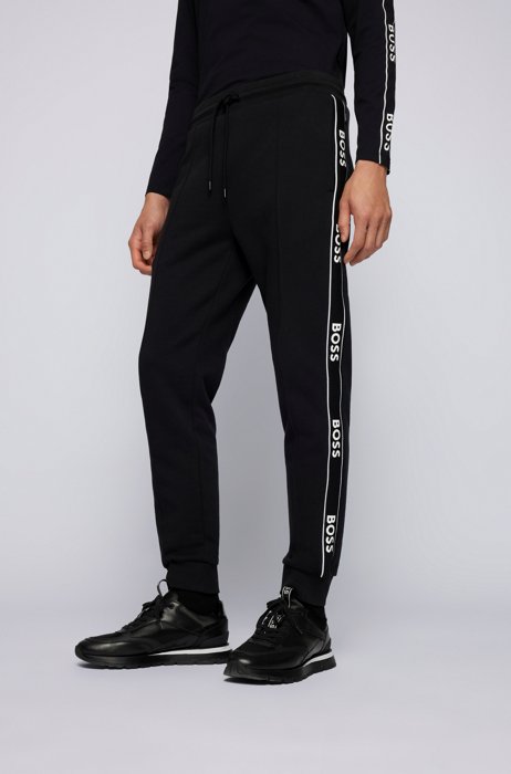 Cotton-blend tracksuit bottoms with logo tape, Black