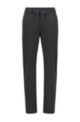 Tapered-fit trousers in melange jersey with stretch, Black