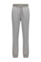 Melange-cotton tracksuit bottoms with embroidered patch, Grey