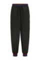 BOSS x NBA relaxed-fit tracksuit bottoms with colourful branding, Black