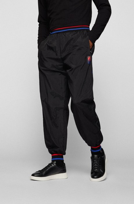 BOSS x NBA relaxed-fit tracksuit bottoms with colorful branding, NBA Generic