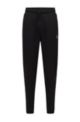Cotton-terry tracksuit bottoms with logo patch, Black