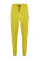 Cotton-blend tracksuit bottoms with logo detail, Yellow