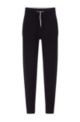 Wool-cashmere tracksuit bottoms with a tapered leg, Black