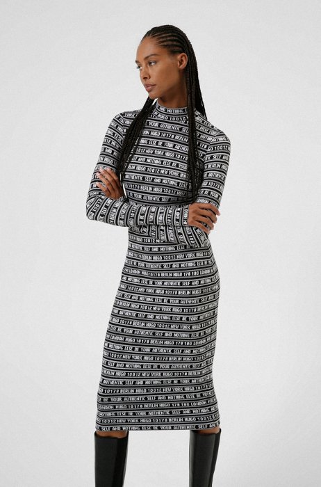 Long-sleeved tube dress with all-over logo statements, Black Patterned