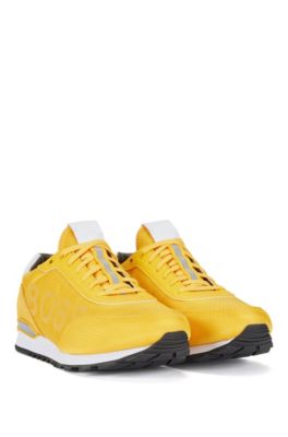 yellow training shoes