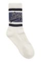 Kwartlange uniseks sokken van een katoenmix met vintage logo, Wit