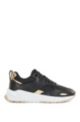 Faux-leather trainers with gold-tone accents, Black