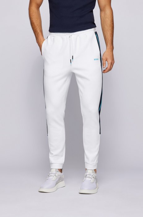 Cotton-blend tracksuit bottoms with side stripes, White
