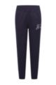 Organic-cotton-blend tracksuit bottoms with logo patch, Dark Blue