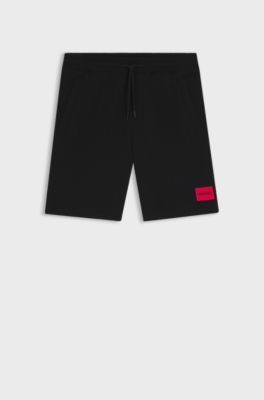 Shorts van katoenen badstof met rood logolabel, Zwart