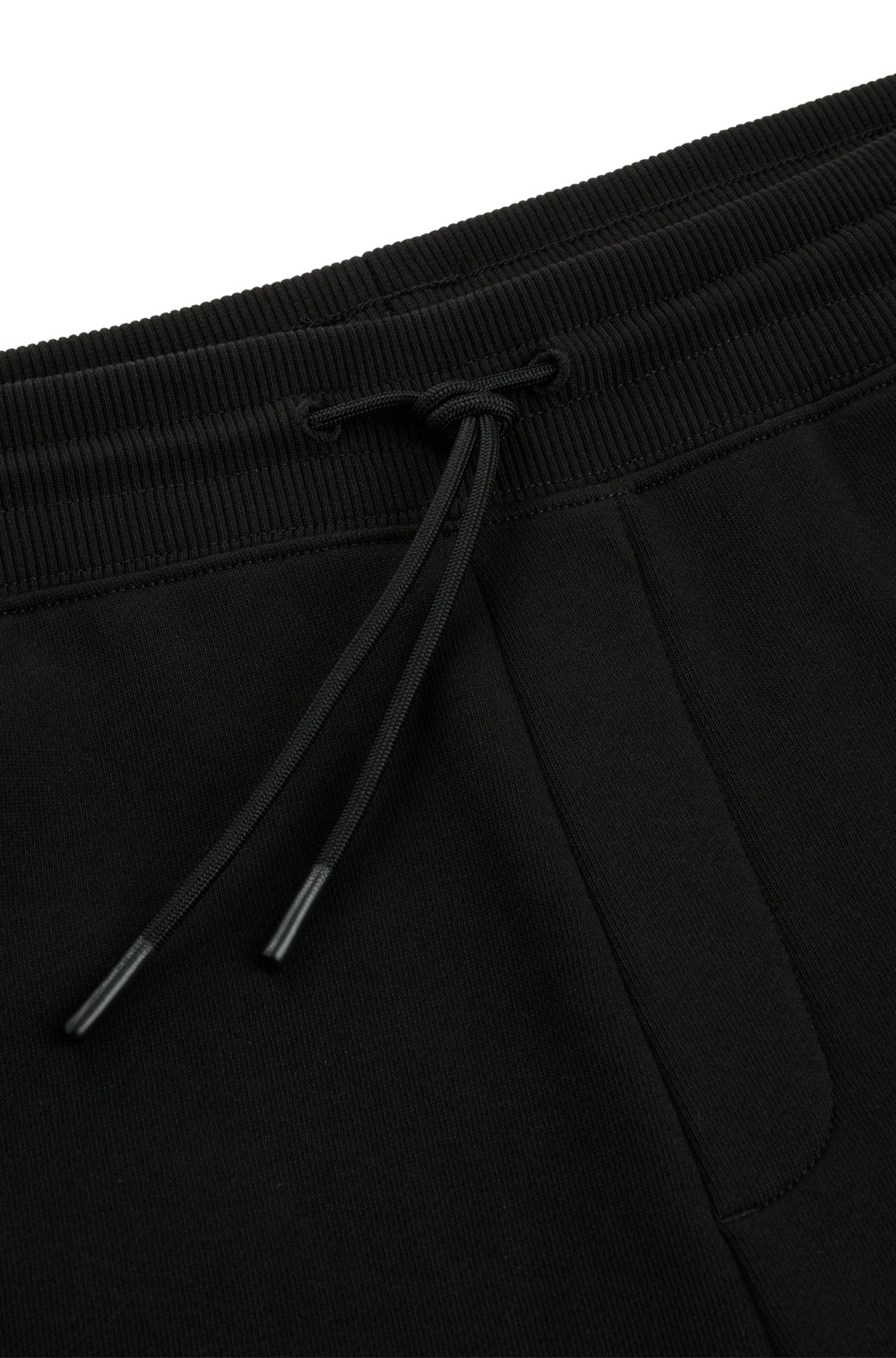 Shorts aus French-Terry-Baumwolle mit rotem Logo-Etikett, Schwarz