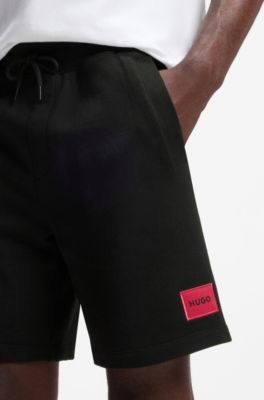 Cotton-terry shorts with red logo label, Black