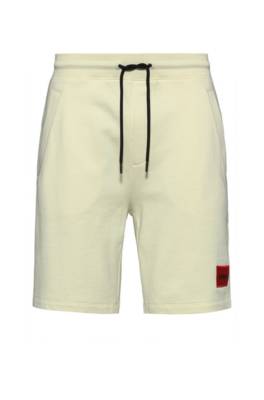 Hugo Boss French-terry-cotton Shorts With Red Logo Label In Yellow