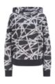 Sweater met capuchon en stippen- en logoprint van katoen, Bedrukt