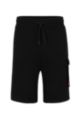 French-terry cotton shorts with red logo label, Black