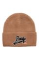 Knitted beanie hat with embroidered logo patch, Beige