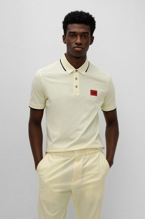 Cotton-piqué slim-fit polo shirt with red logo label, Light Yellow