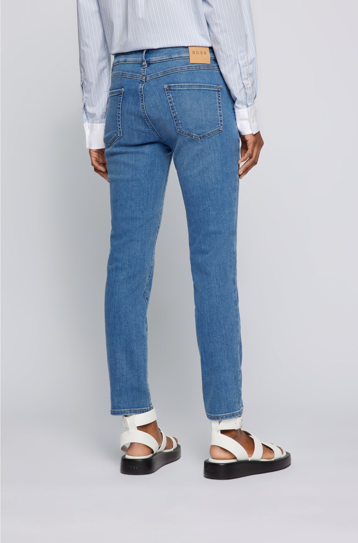 BOSS - Slim-fit jeans in bright-blue super-stretch denim