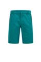 Slim-fit shorts in een dobbygeweven katoenmix, Groen