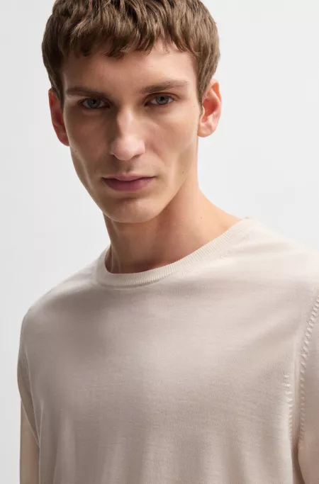 Slim-fit sweater in merino wool with crew neckline