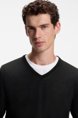 Maglione in lana merino extra-fine con scollo a V, Nero