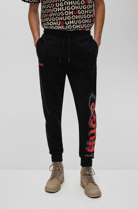 Cotton-terry tracksuit bottoms with cyber-shadow logo, Black