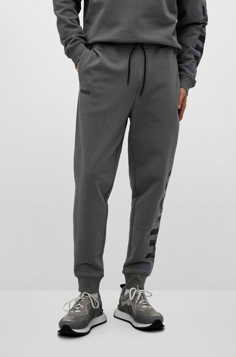 Cotton-terry tracksuit bottoms with cyber-shadow logo, Light Grey