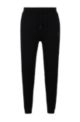 Cotton-terry tracksuit bottoms with logo patch, Black