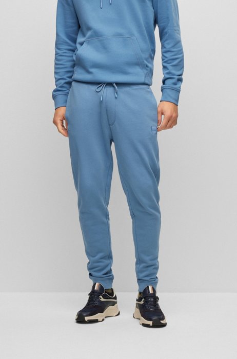 Cotton-terry tracksuit bottoms with logo patch, Light Blue