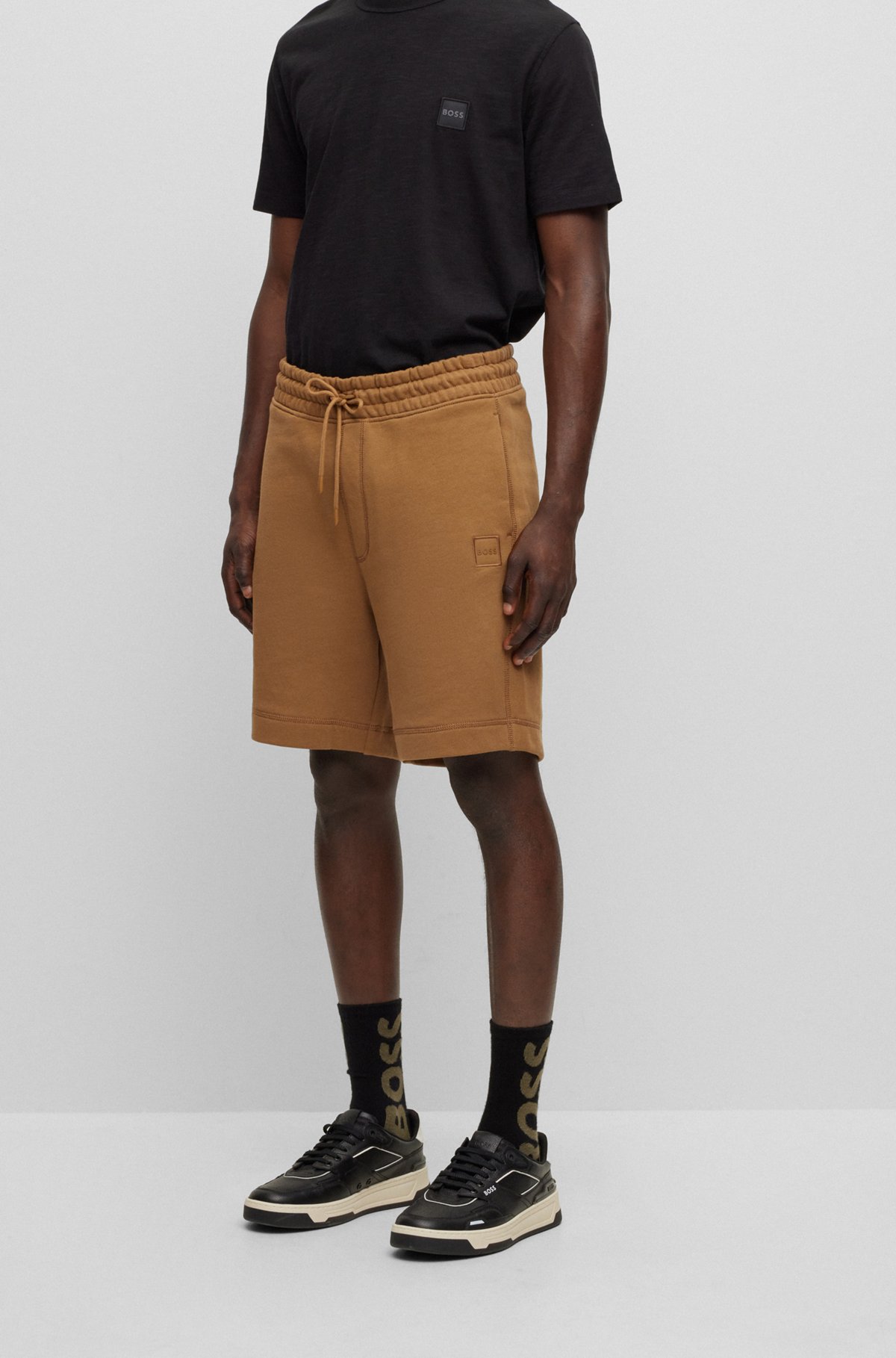 Drawstring shorts in French terry cotton with logo patch, Brown