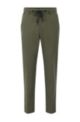 Packable slim-fit trousers in performance-stretch mesh, Green