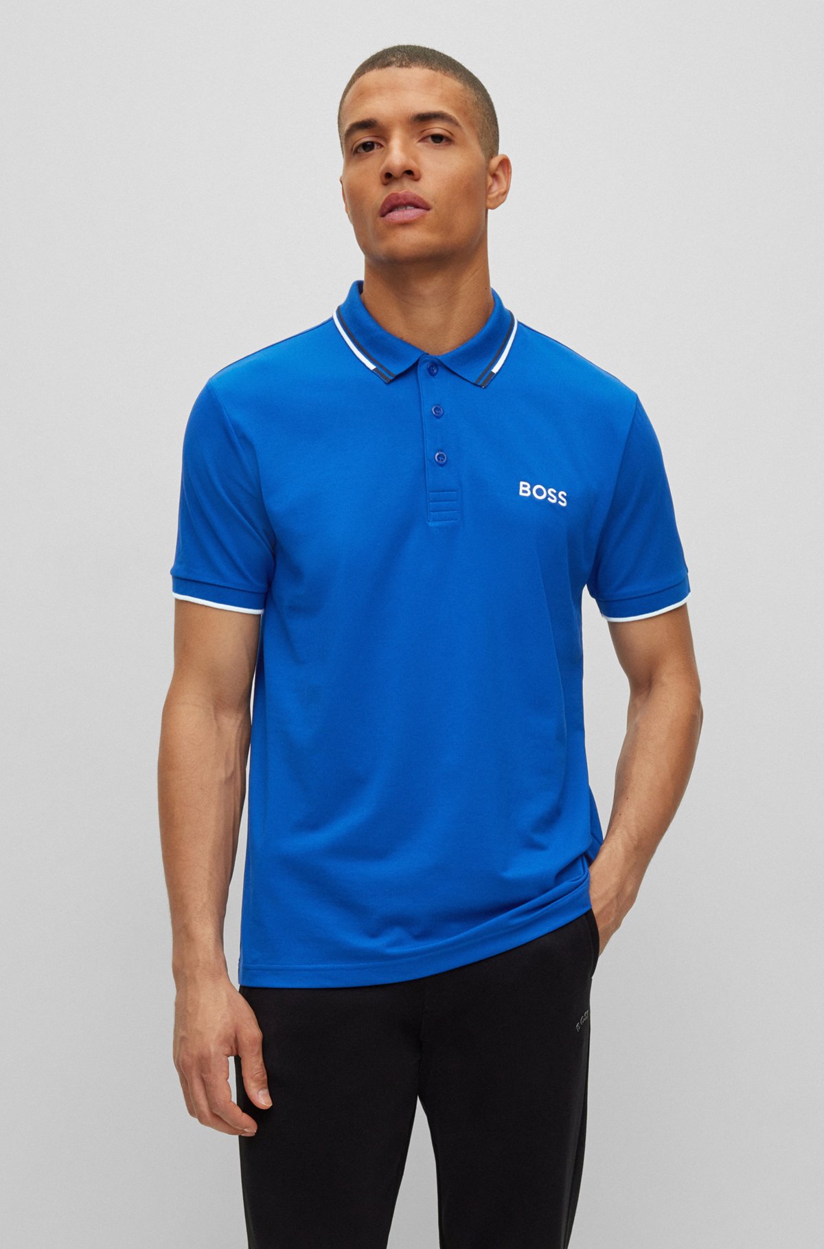 - Cotton-blend polo shirt with contrast details