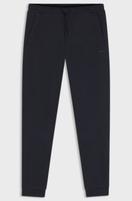 Cotton tracksuit bottoms with curved logo, Dark Blue