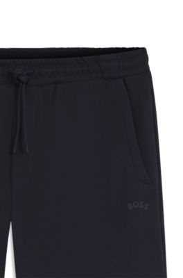 Cotton tracksuit bottoms with curved logo, Dark Blue