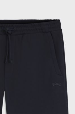 Cotton tracksuit bottoms with curved logo, Dark Blue