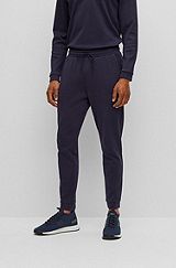 Cotton tracksuit bottoms with curved logo, Dark Blue