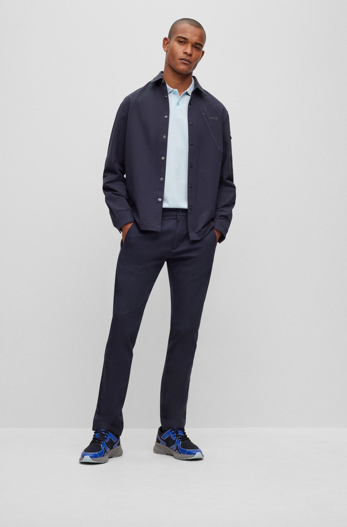 Polo Slim Fit en piqué de coton stretch à logo incurvé, bleu clair