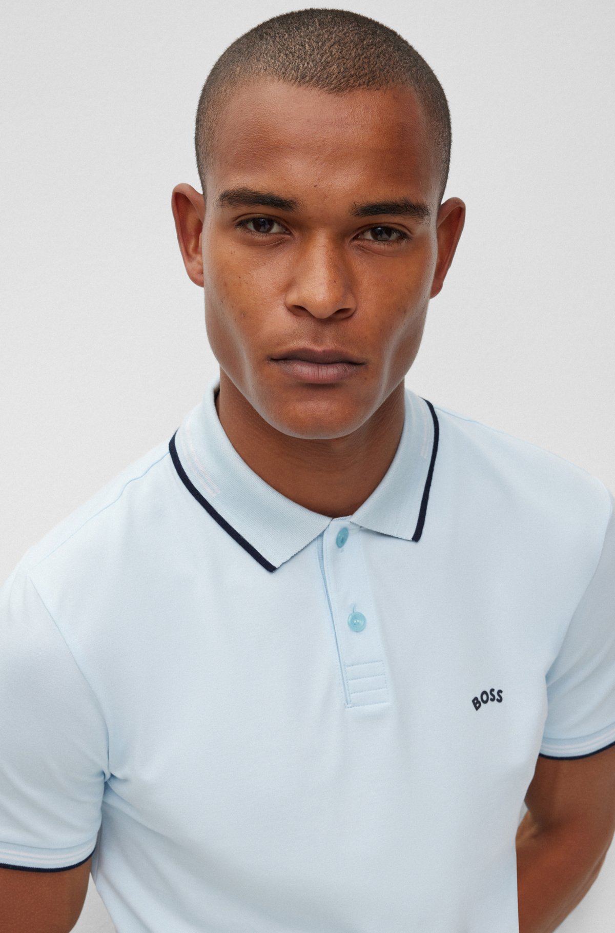 Curved-logo slim-fit polo shirt in stretch-cotton piqué, Light Blue