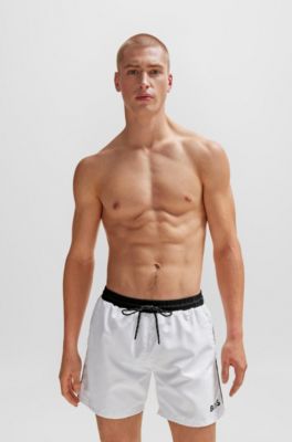 BOSS - Contrast-logo swim shorts in recycled material