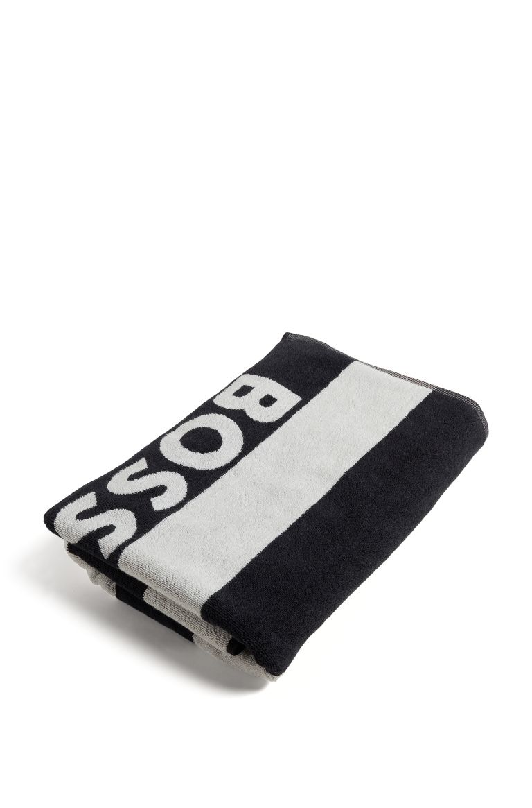 hugoboss.com | Badetuch aus Baumwolle mit Logo und Blockstreifen