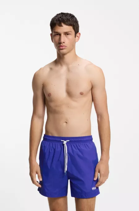Swim shorts with contrast logo print