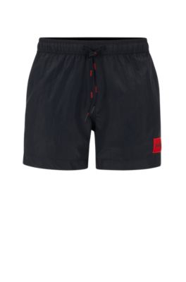 HUGO Quick dry swim shorts with red logo label