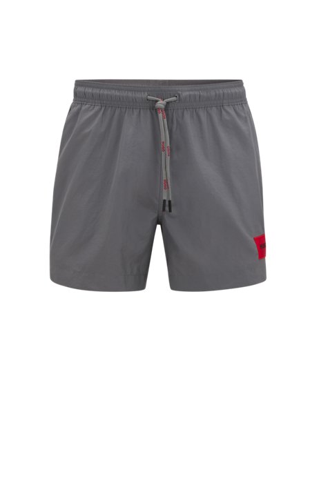 Quick-drying swim shorts with red logo label, Dark Grey